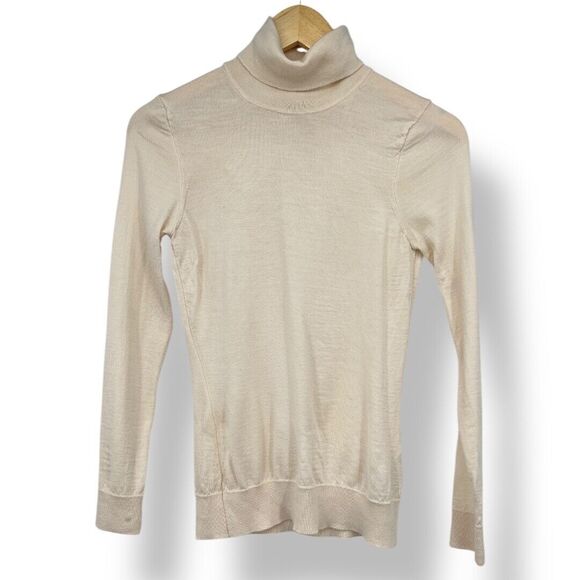 Asket The Merino Turtleneck in Off White Cream in 100% Extra Fine Merino Wool XS - Picture 1 of 10